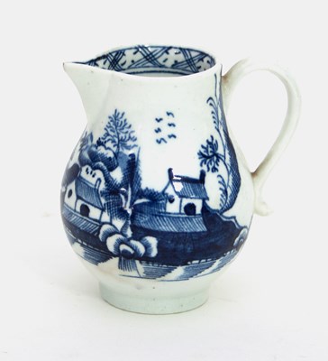 Lot 983 - A Lowestoft blue and white sparrow beak jug,...