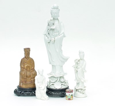 Lot 1031 - A Chinese blanc-de-chine figure of Guanyin,...