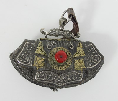 Lot 1037 - A Tibetan silver and yellow metal embellished...