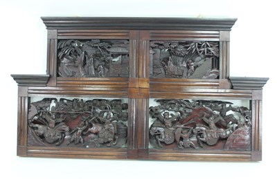 Lot 1050 - A Chinese hardwood overmantel, carved and...