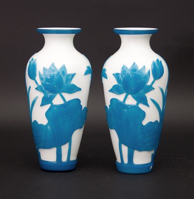 Lot 1059 - A pair of Chinese cameo glass vases, of...