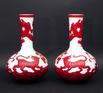 Lot 1060 - A large pair of Chinese cameo glass vases, of...