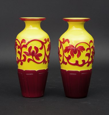 Lot 1061 - A pair of Chinese cameo glass vases, of...