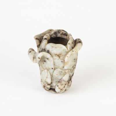 Lot 1066 - A Chinese jade vase of magnolia form, Qing...