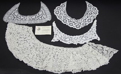 Lot 1095 - A Belgian needle lace bertha, late 19th...