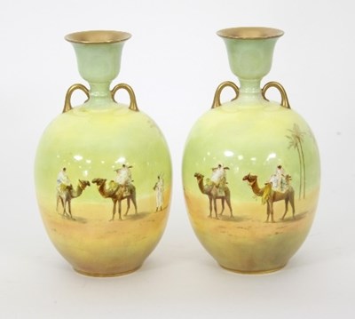 Lot 20 - A pair of Royal Doulton vases, early 20th...