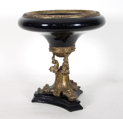 Lot 22 - A Continental black glazed and gilt metal...