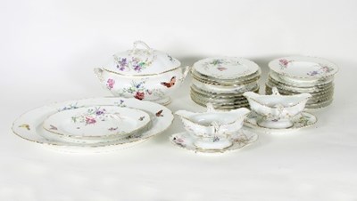 Lot 38 - A Paris porcelain part dinner service, early...