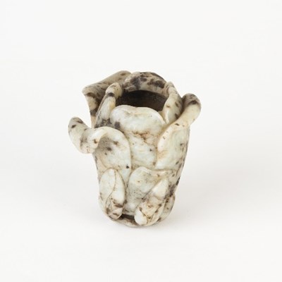 Lot 69 - A Chinese jade vase of magnolia form, Qing...