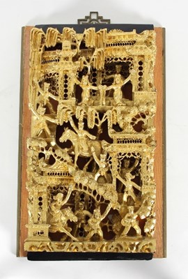 Lot 73 - A Chinese giltwood wall carving, depicting...