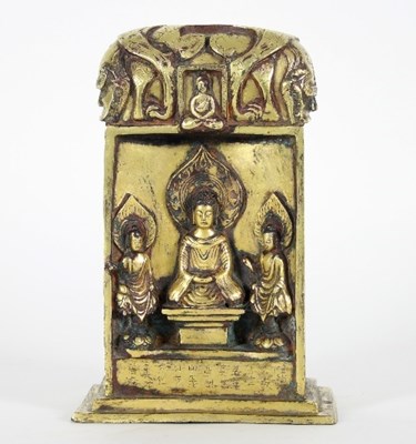 Lot 76 - An Oriental cast gilt metal statue of...