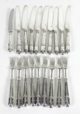 Lot 86 - A part set of silver dessert knives and forks,...