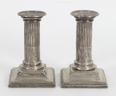 Lot 93 - A pair of dwarf silver candlesticks, HE Ltd,...