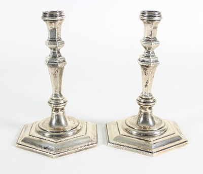 Lot 98 - A pair of George I style silver candlesticks,...