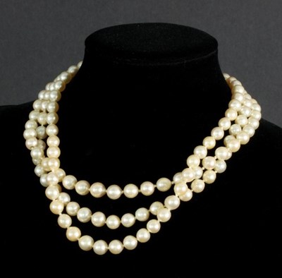 Lot 120 - A cultured pearl three-row necklace with a...