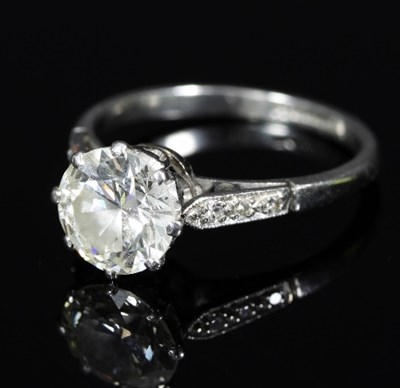 Lot 157 - A diamond solitaire ring, the diamond of...