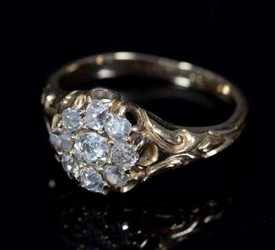 Lot 161 - A diamond cluster ring, the nine stone cluster...