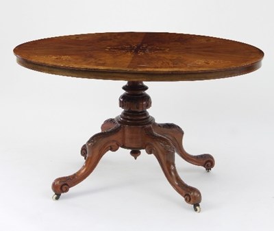 Lot 463 - A Victorian walnut oval loo table, the boxwood...