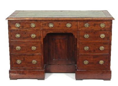 Lot 473 - A late Georgian mahogany pedestal writing desk,...