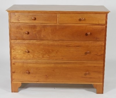 Lot 475 - A Shaker cherry wood chest of drawers of two...