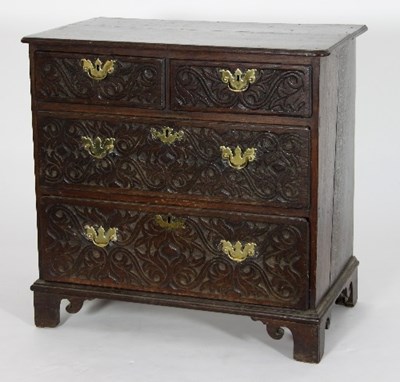 Lot 484 - An 18th Century oak chest of two long and two...