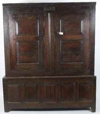 Lot 488 - An 18th Century oak press cupboard, the top...