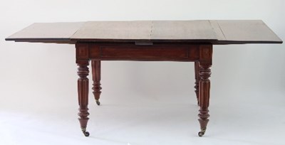 Lot 507 - A William IV mahogany withdraw library table...