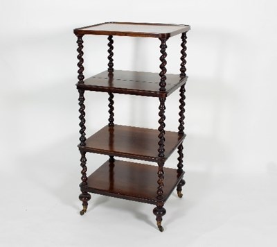 Lot 519 - A Victorian simulated rosewood what-not, the...