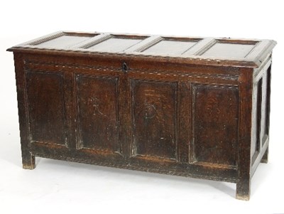 Lot 537 - An 18th Century oak chest with quadruple panel...