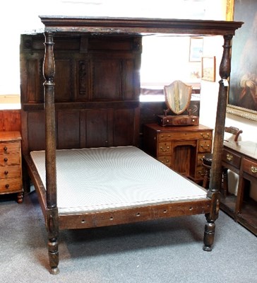 Lot 544 - An 18th Century and later four-poster bed, the...