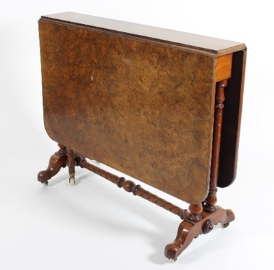 Lot 553 - A Victorian figured walnut two-flap table,...