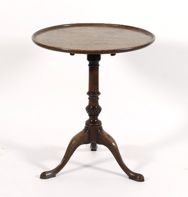 Lot 558 - A circular mahogany tripod table, on a turned...