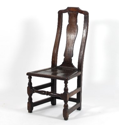 Lot 566 - An oak single chair with vase shaped splat to...