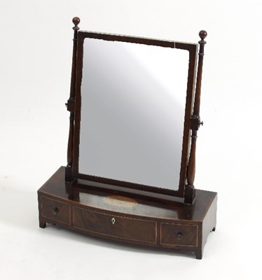 Lot 570 - A mahogany swing frame toilet mirror, the...