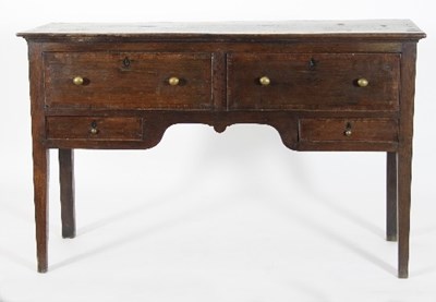 Lot 577 - An oak kneehole sideboard, fitted four drawers...