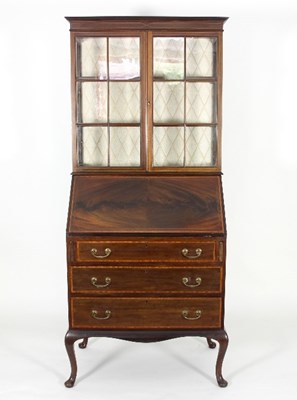 Lot 591 - An Edwardian mahogany bureau bookcase, banded...