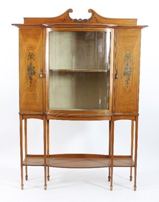 Lot 597 - An Edwardian satinwood display cabinet with...