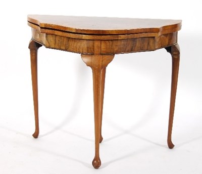 Lot 603 - A burr walnut card table of Regency design...