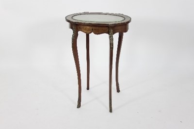 Lot 610 - An early 20th Century kingwood display table,...