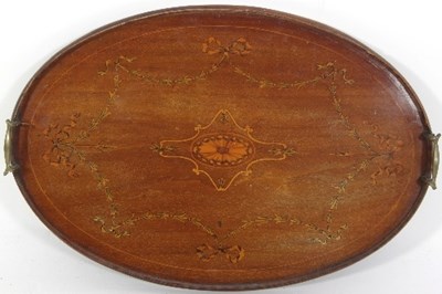 Lot 621 - An Edwardian oval tray with brass handles and...