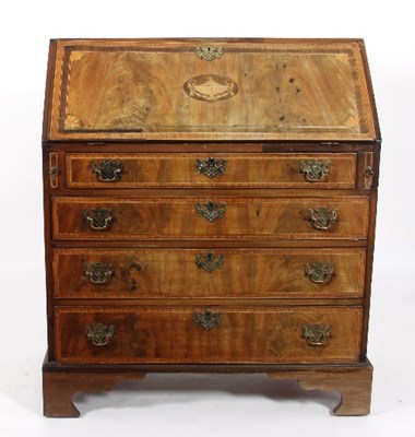 Lot 626 - A late 18th Century mahogany bureau, banded in...