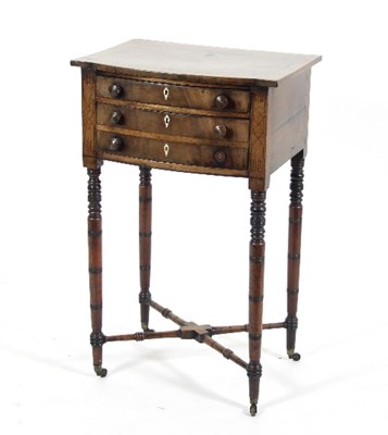 Lot 643 - A 19th Century walnut work table fitted with...