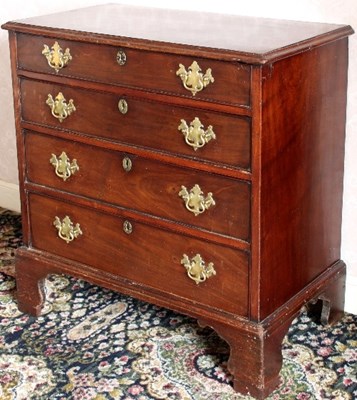 Lot 653 - A George III mahogany chest with four...