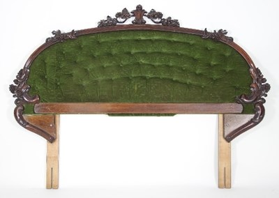 Lot 654 - A Victorian carved walnut headboard, the frame...