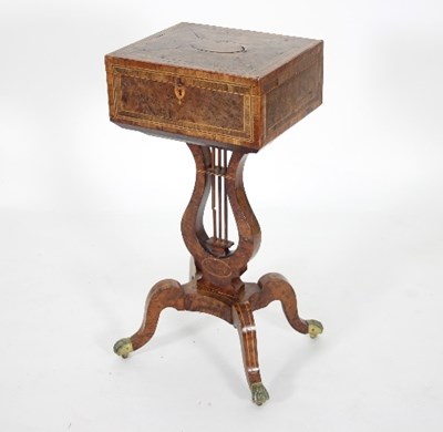 Lot 666 - A walnut work stand, the box crossbanded with...