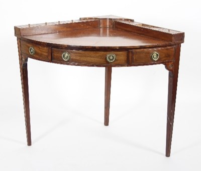 Lot 667 - A 19th Century mahogany corner desk, the later...