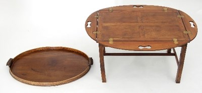 Lot 686 - A yew wood butler's tray, the hinged sides...