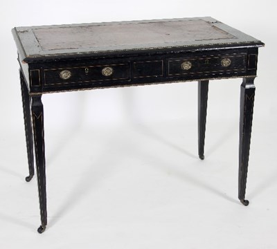 Lot 687 - A Victorian ebonised writing table, with inset...