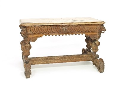 Lot 714 - A Renaissance revival carved oak library table,...