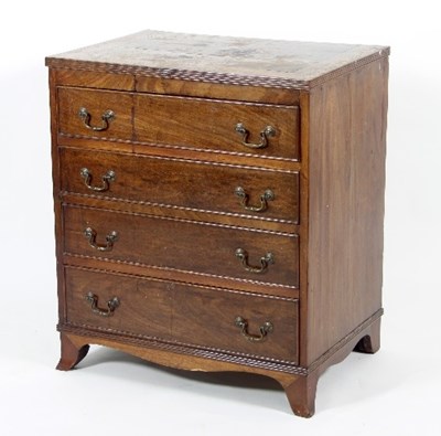 Lot 718 - A narrow mahogany chest of four drawers on...